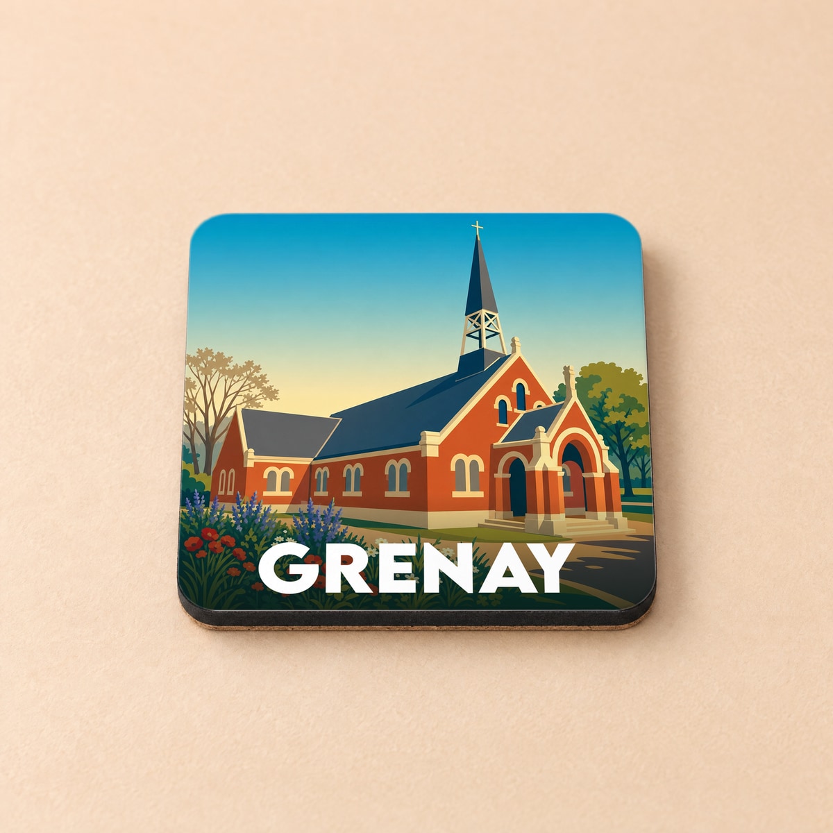 Dessous de verre souvenir de la ville de Grenay avec une illustration stylisée d'une église.