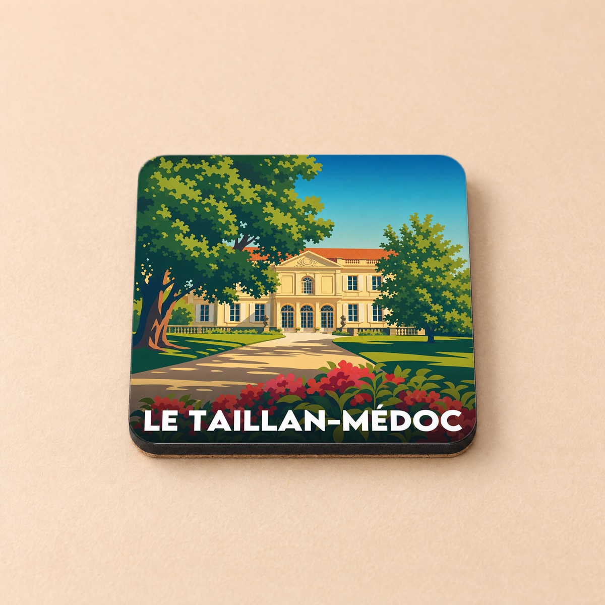 Dessous de verre souvenir de la ville de Le Taillan-Médoc avec une illustration stylisée d'un château.