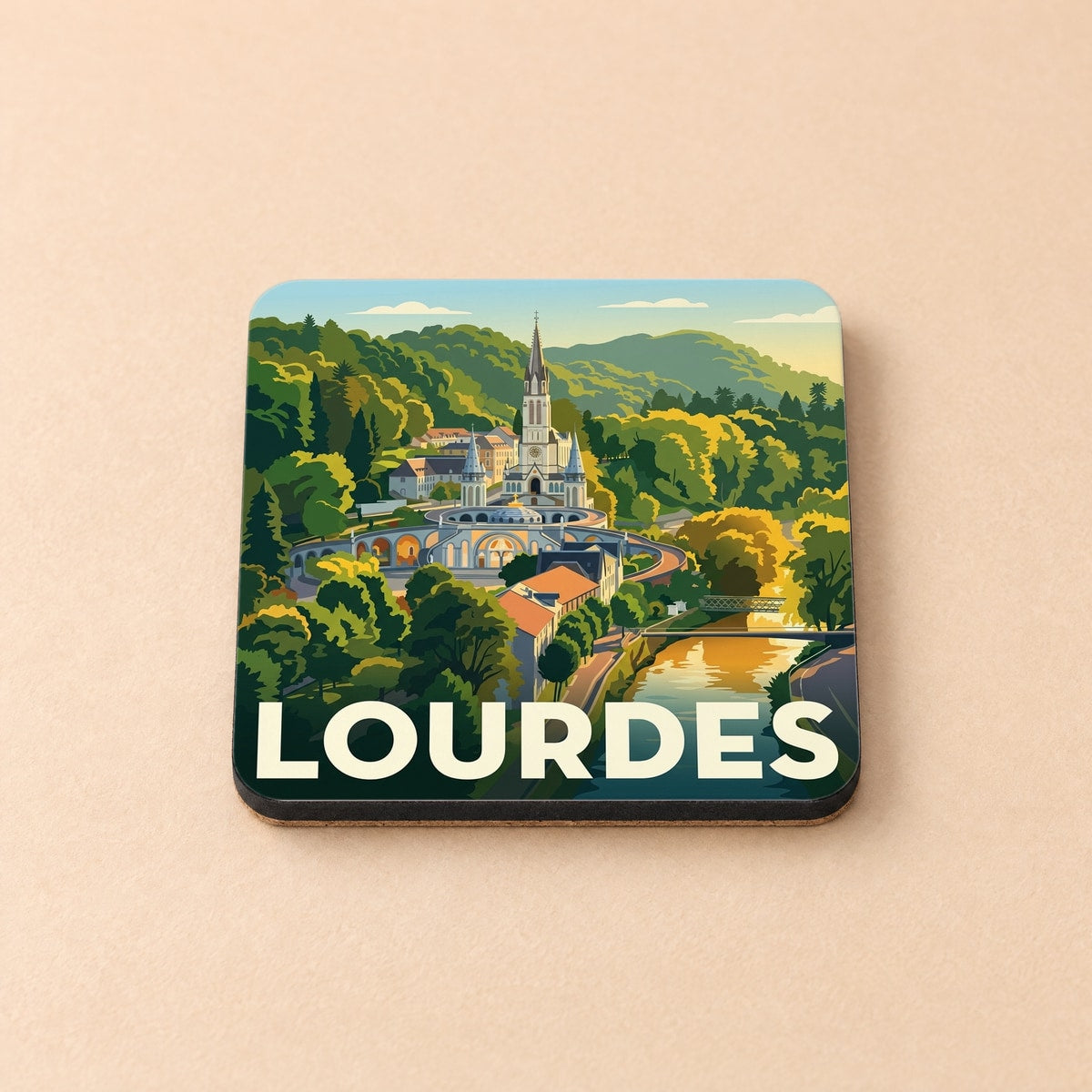 Dessous de verre souvenir de la ville de Lourdes avec une illustration stylisée du Sanctuaire.
