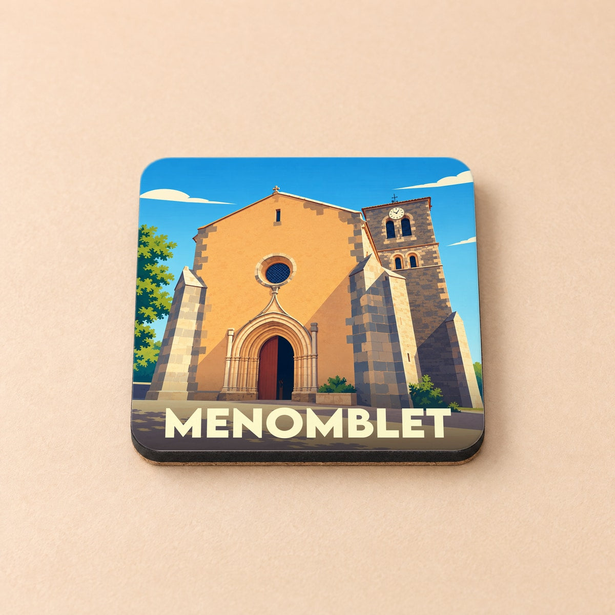 Dessous de verre souvenir de la ville de Menomblet avec une illustration stylisée de son église.