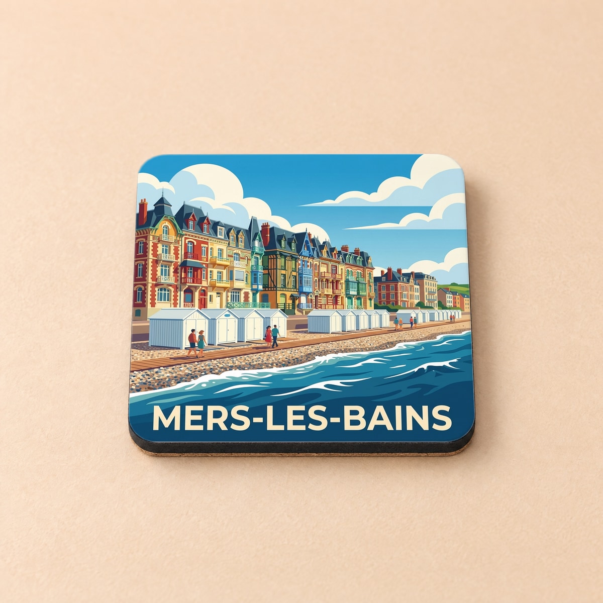 Dessous de verre souvenir de la ville de Mers-les-Bains avec une illustration stylisée de son front de mer coloré.