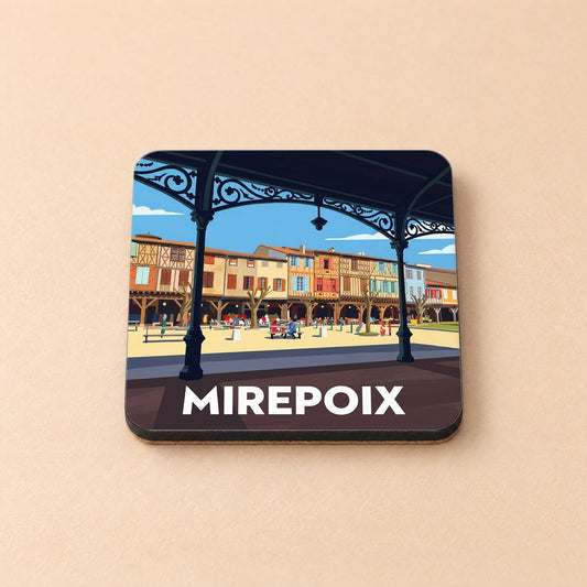 Dessous de verre souvenir de la ville de Mirepoix avec une illustration stylisée de sa place médiévale.