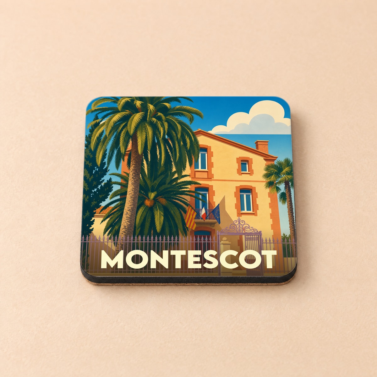 Dessous de verre souvenir de la ville de Montescot avec une illustration stylisée de sa mairie.