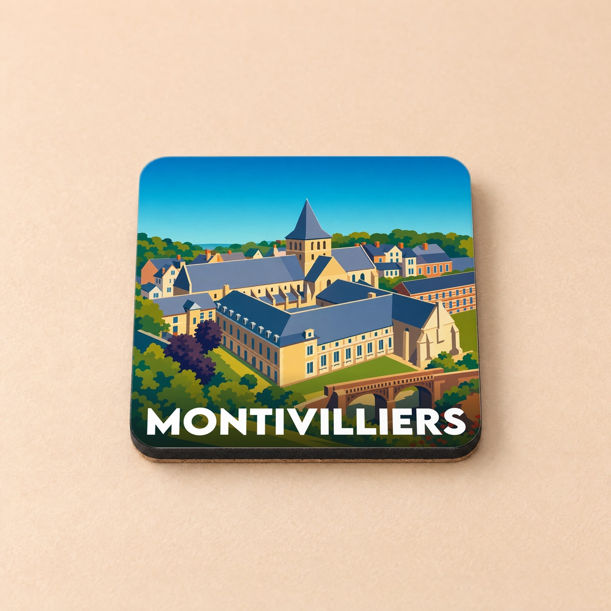 Dessous de verre souvenir de la ville de Montivilliers avec une illustration stylisée de son abbaye.