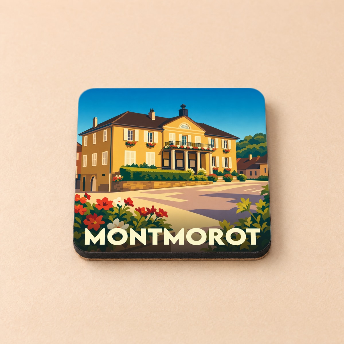 Dessous de verre souvenir de la ville de Montmorot avec une illustration stylisée d'un bâtiment historique.
