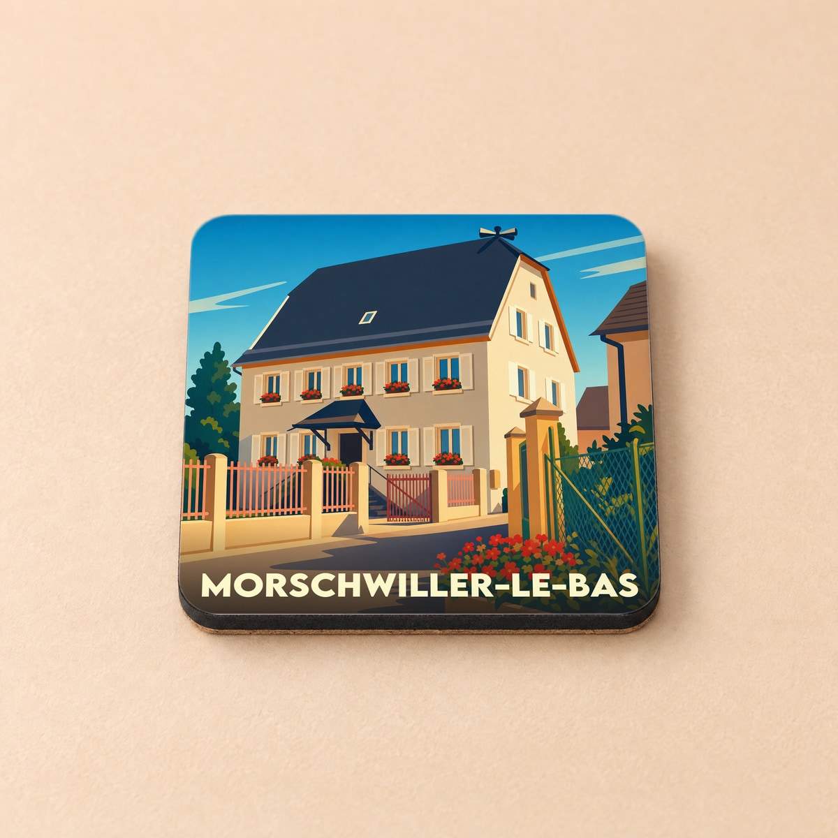 Dessous de verre souvenir de la ville de Morschwiller-le-Bas avec une illustration stylisée d'une maison traditionnelle alsacienne.