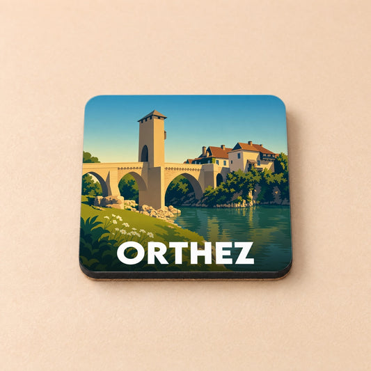 Dessous de verre souvenir de la ville d'Orthez avec une illustration stylisée de son célèbre Pont Vieux.