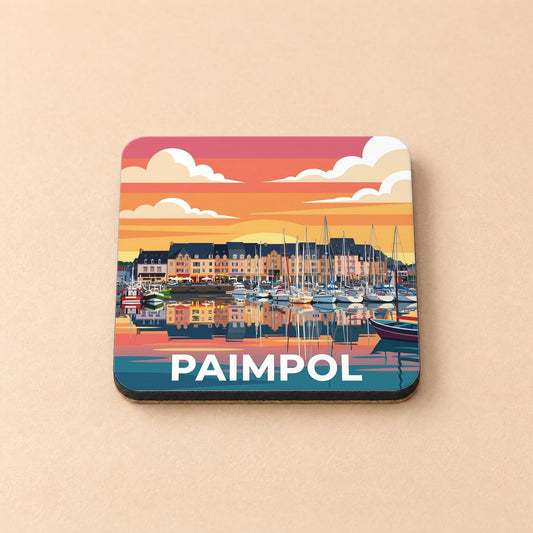 Dessous de verre souvenir de la ville de Paimpol avec une illustration stylisée de son port au coucher du soleil.