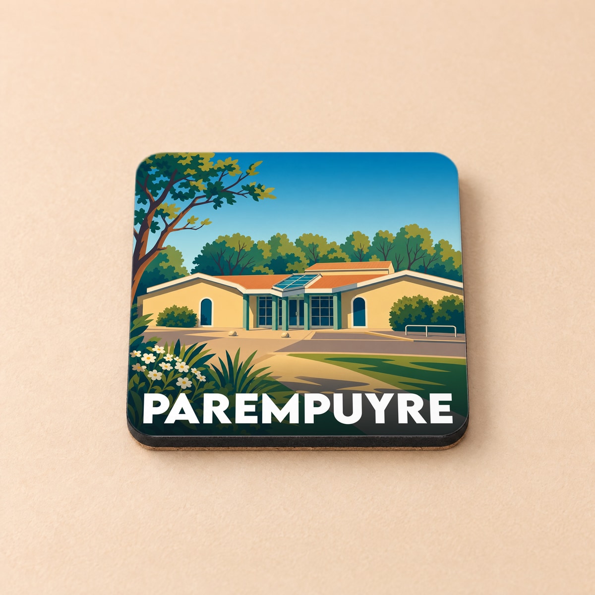 Dessous de verre souvenir de la ville de Parempuyre avec une illustration stylisée d'un bâtiment moderne.