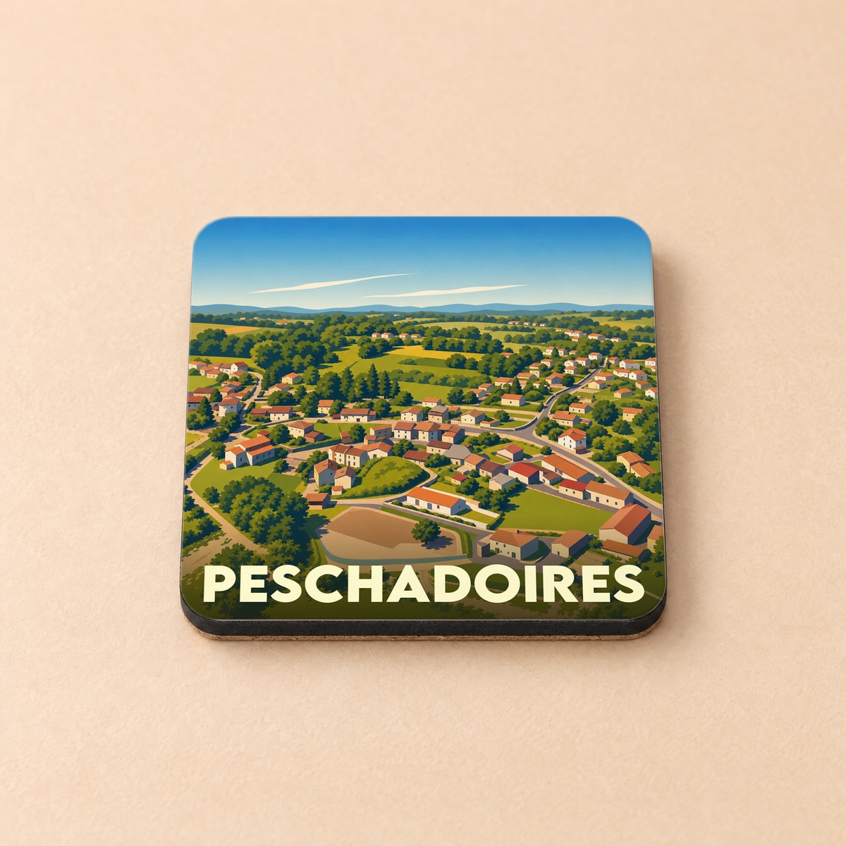 Dessous de verre souvenir de la ville de Peschadoires avec une illustration stylisée d'un village niché dans la verdure.