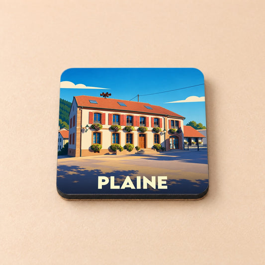 Dessous de verre souvenir de la ville de Plaine avec une illustration stylisée d'un bâtiment traditionnel.