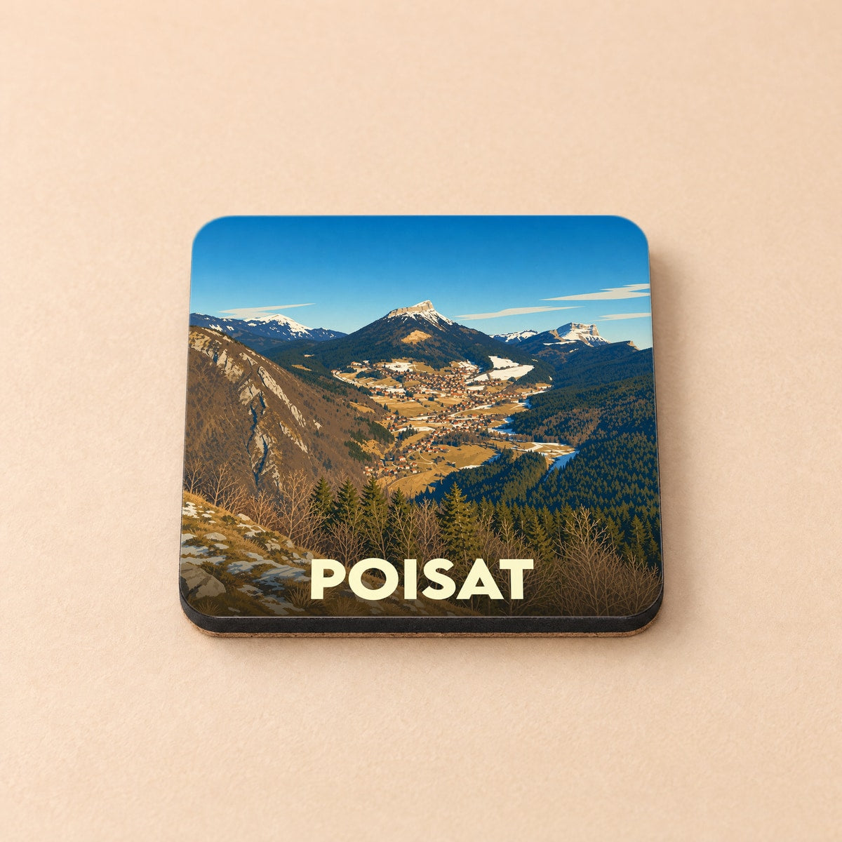 Dessous de verre souvenir de la ville de Poisat avec une illustration stylisée de montagnes.