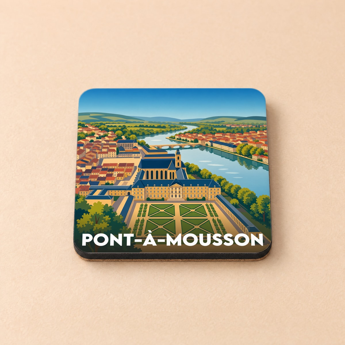 Dessous de verre souvenir de la ville de Pont-à-Mousson avec une illustration stylisée de l'Abbaye des Prémontrés et de la Moselle.