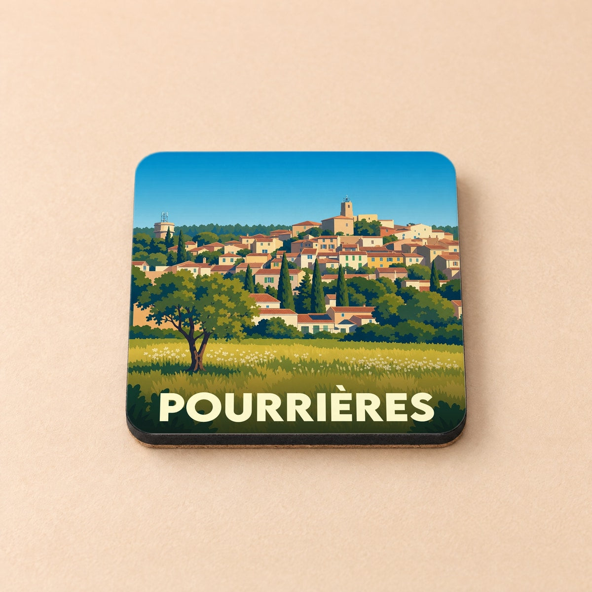 Dessous de verre souvenir de la ville de Pourrières avec une illustration stylisée d'un village provençal.