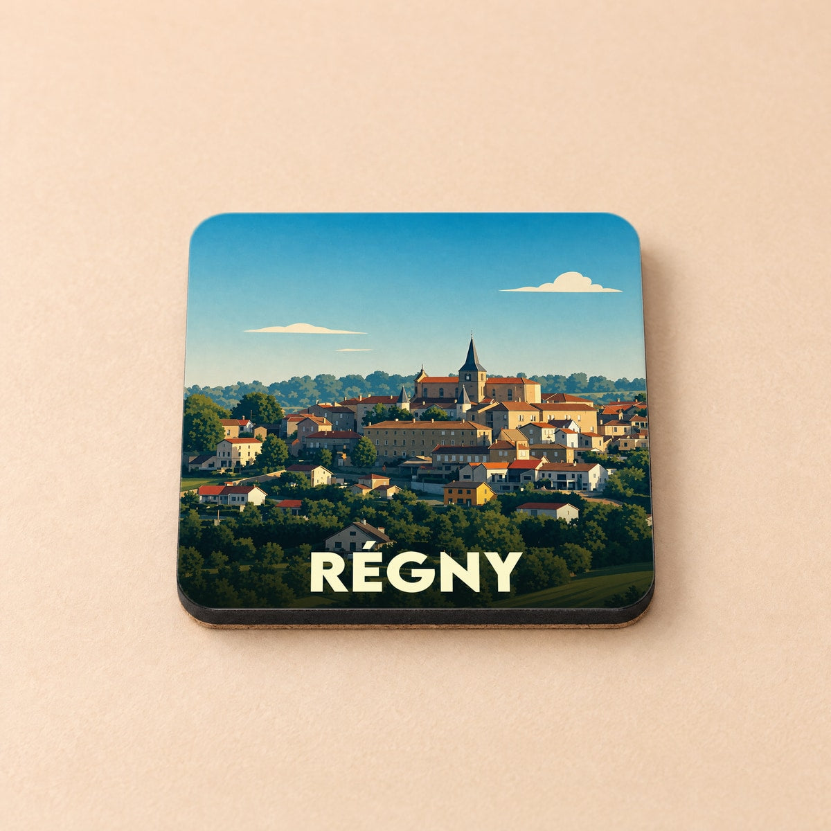 Dessous de verre souvenir de la ville de Régny avec une illustration stylisée.