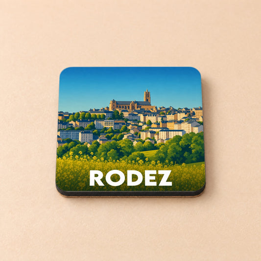 Dessous de verre souvenir de la ville de Rodez avec une illustration stylisée.