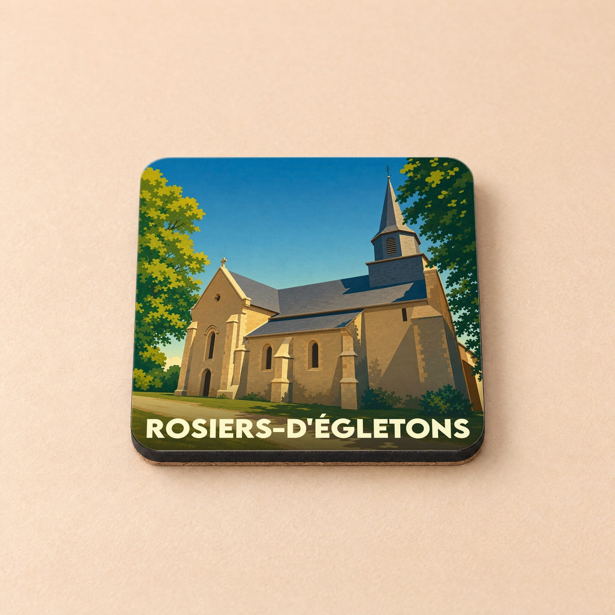 Dessous de verre souvenir de la ville de Rosiers-d'Égletons avec une illustration stylisée de son église.