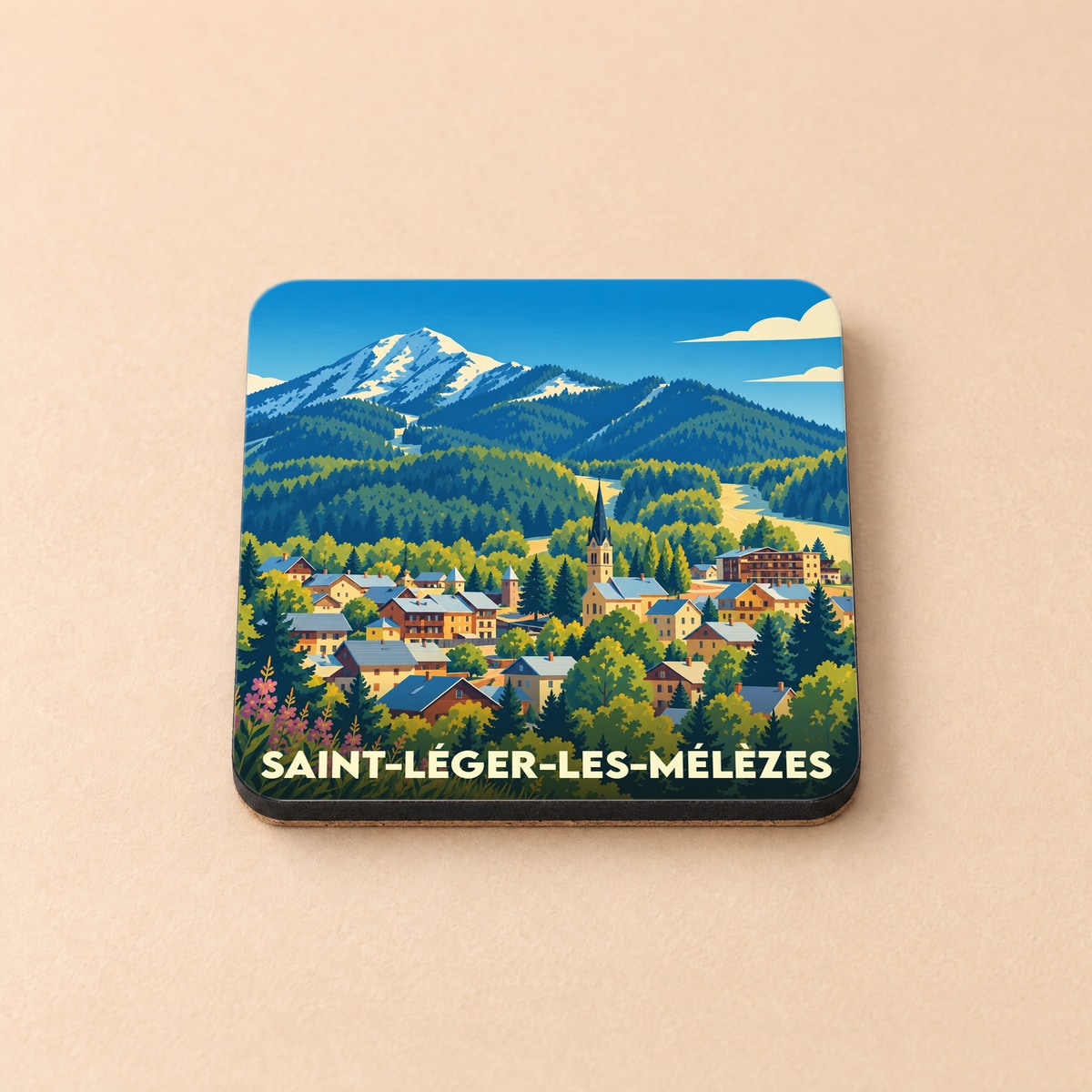 Dessous de verre souvenir de la ville de Saint-Léger-les-Mélèzes avec une illustration stylisée de montagne.