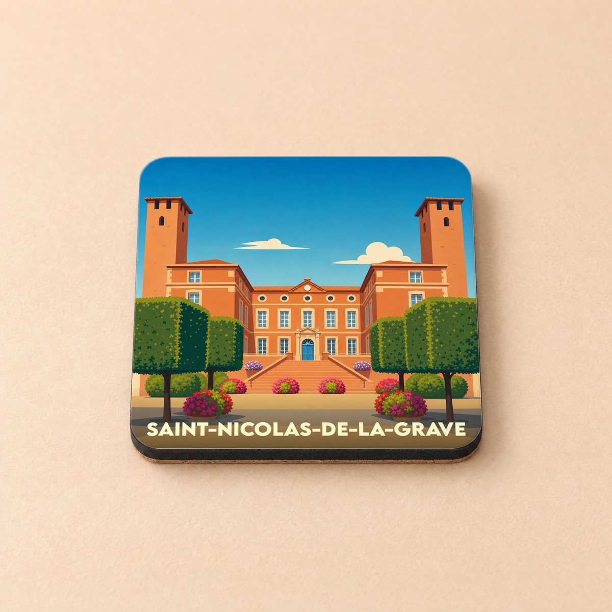 Dessous de verre souvenir de Saint-Nicolas-de-la-Grave avec une illustration stylisée de son château.
