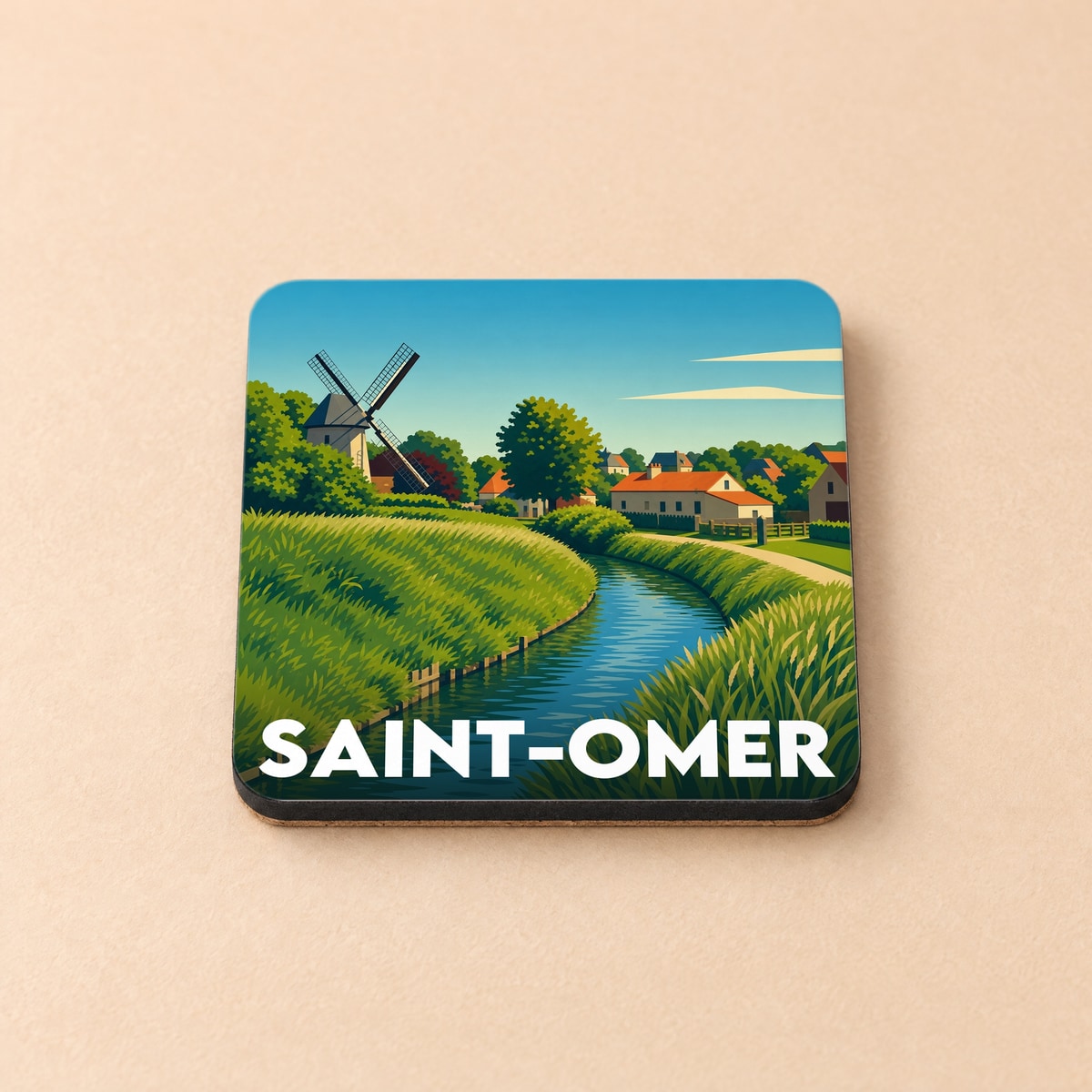 Dessous de verre souvenir de la ville de Saint-Omer avec une illustration stylisée d'un paysage de marais et son moulin.