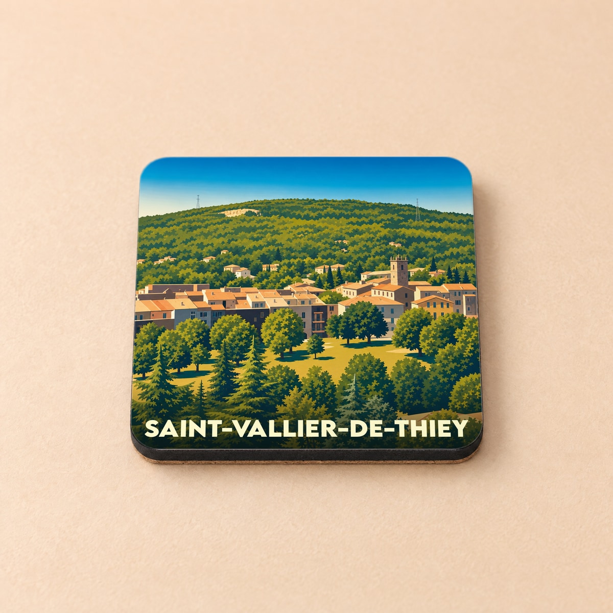 Dessous de verre souvenir de la ville de Saint-Vallier-de-Thiey avec une illustration stylisée.