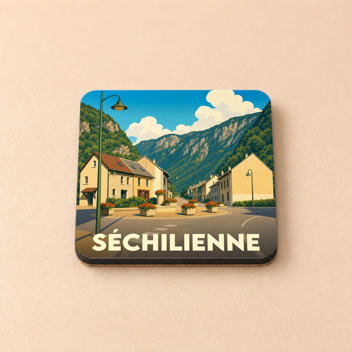 Dessous de verre souvenir de la ville de Séchilienne avec une illustration stylisée.