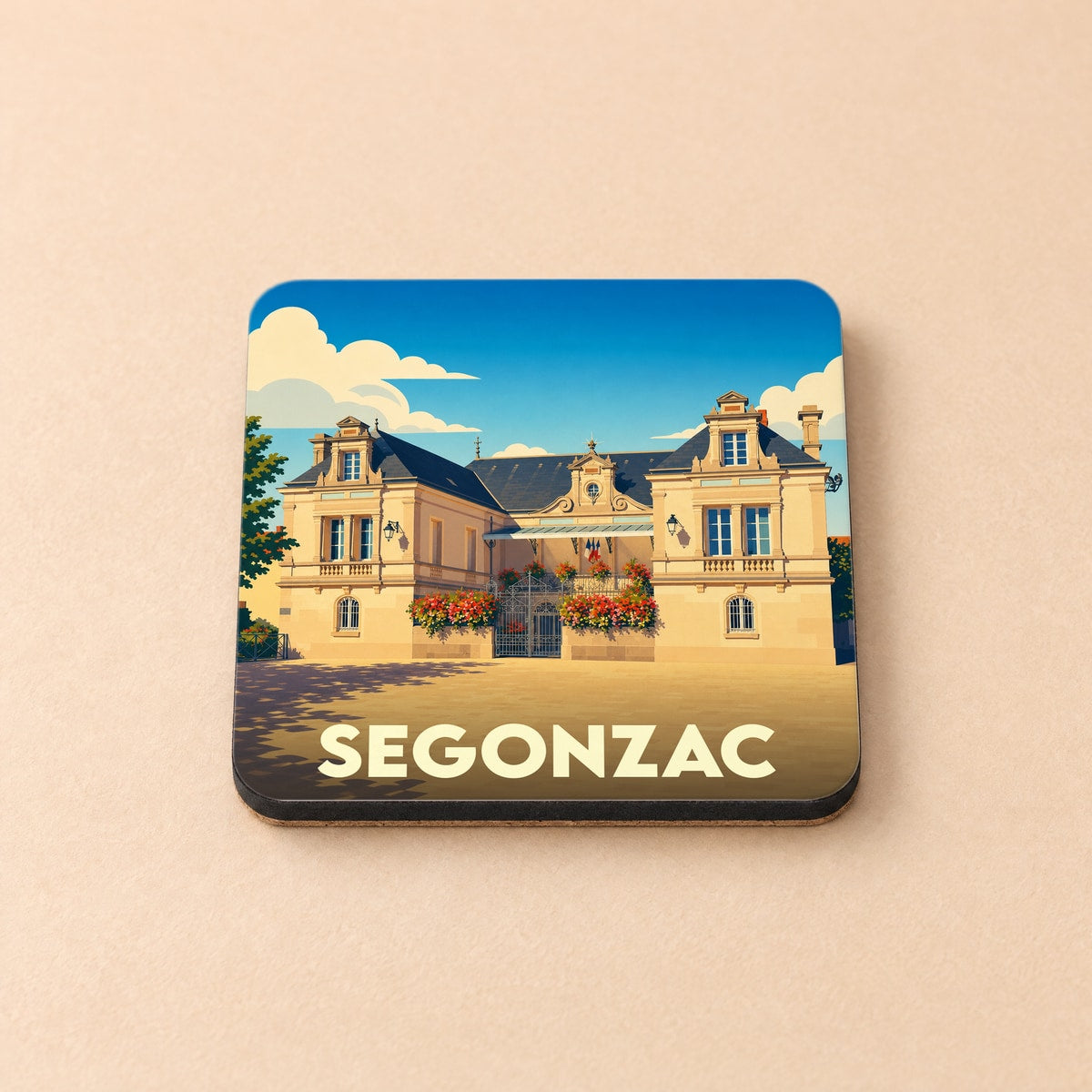 Dessous de verre souvenir de la ville de Segonzac avec une illustration stylisée de sa mairie.