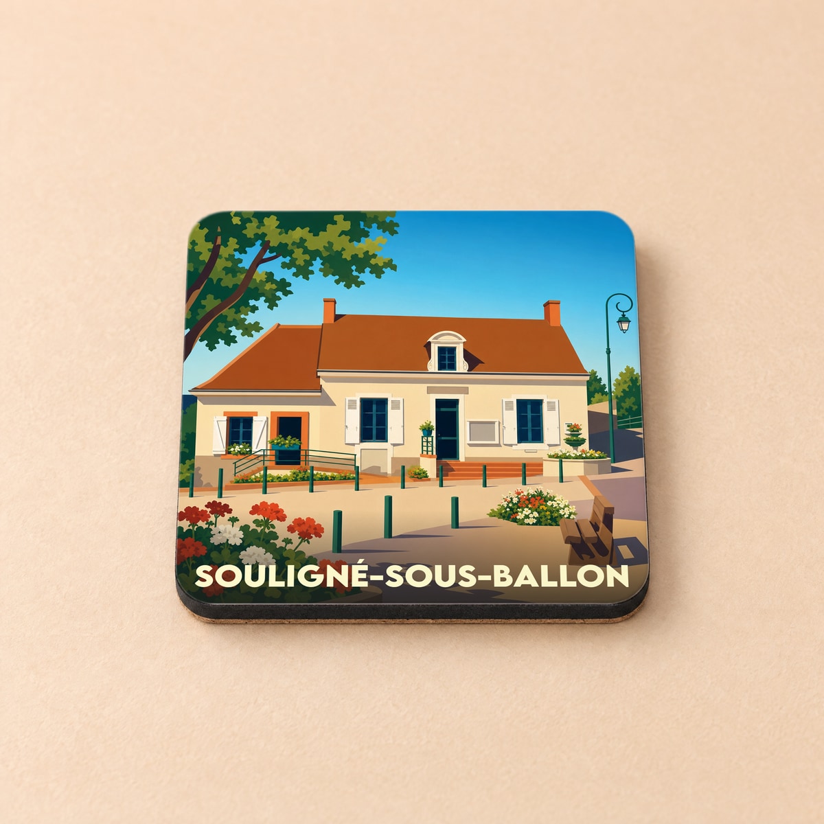 Dessous de verre souvenir de la ville de Souligné-sous-Ballon avec une illustration stylisée.