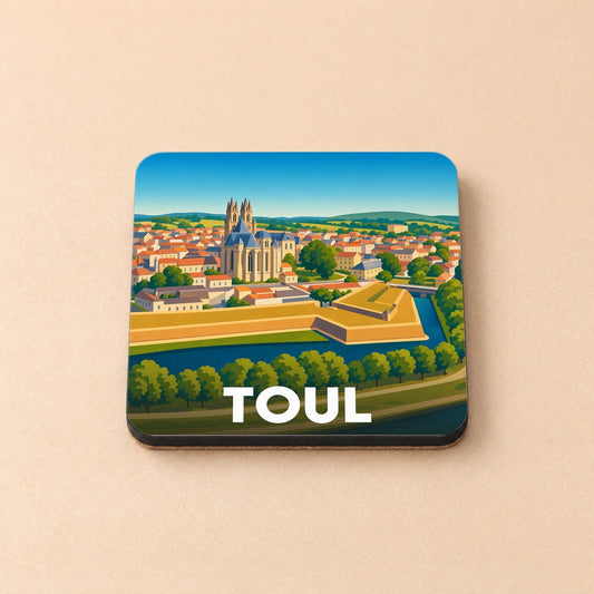 Dessous de verre souvenir de la ville de Toul avec une illustration stylisée de ses remparts et de sa cathédrale.