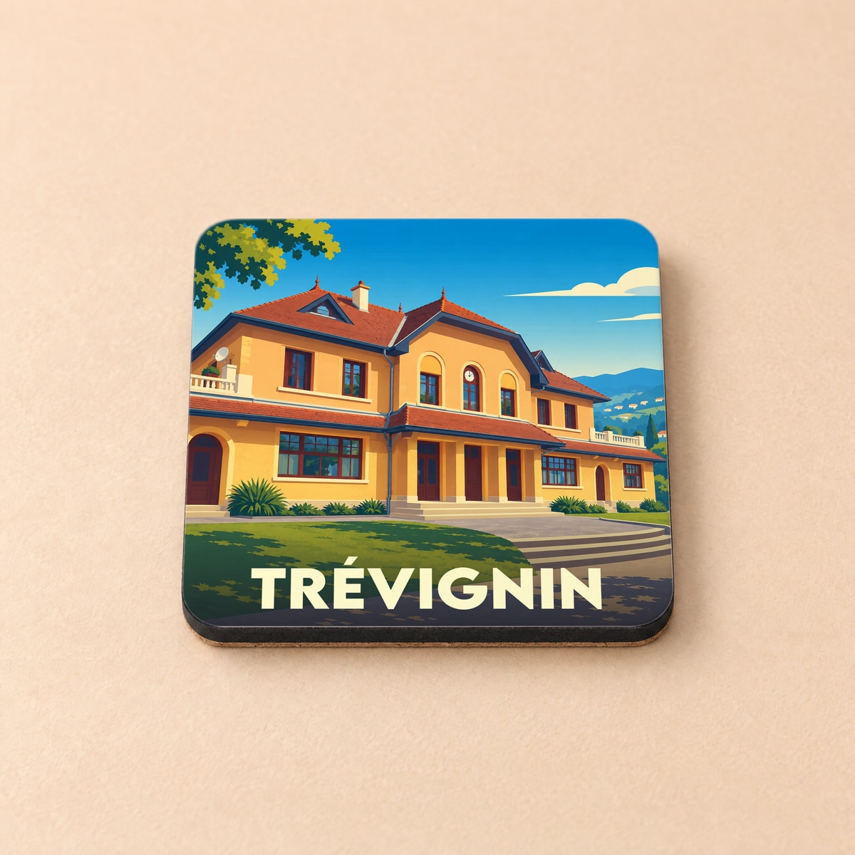 Dessous de verre souvenir de la ville de Trévignin avec une illustration stylisée d'un bâtiment typique.