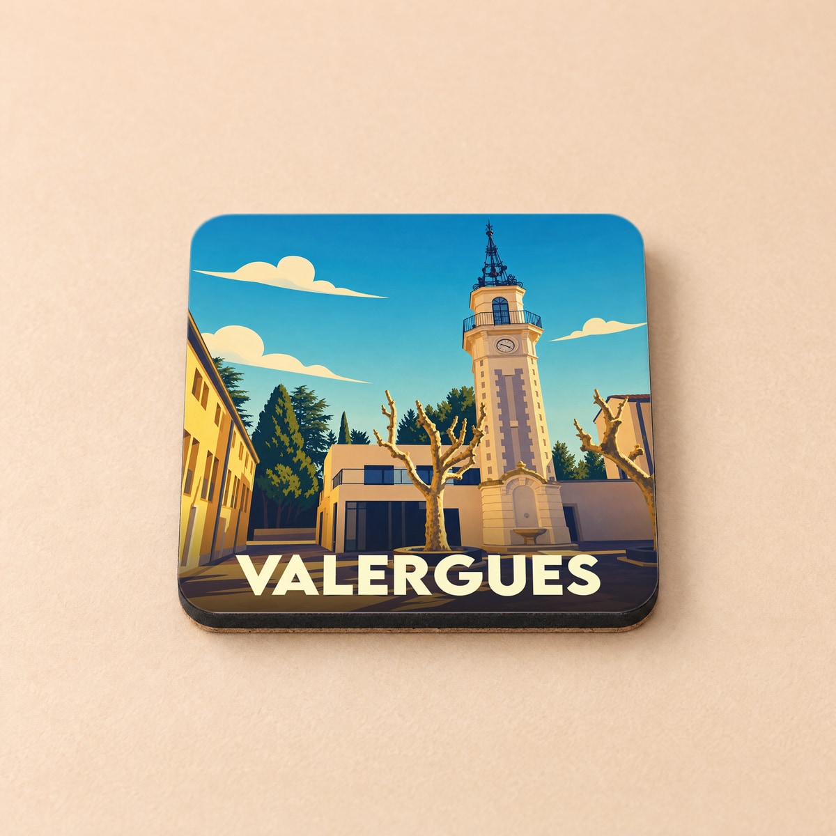 Dessous de verre souvenir de la ville de Valergues avec une illustration stylisée de son clocher et de sa place.