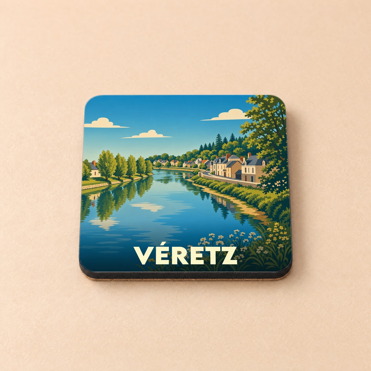 Dessous de verre souvenir de la ville de Véretz avec une illustration stylisée d'un paysage fluvial.