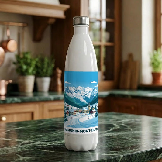 Gourde souvenir de la ville de Chamonix-Mont-Blanc avec une illustration stylisée de montagnes enneigées.