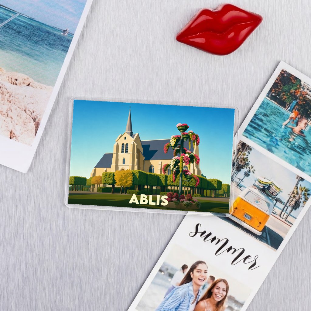 Magnet souvenir de la ville de Ablis avec une illustration stylisée de son église.