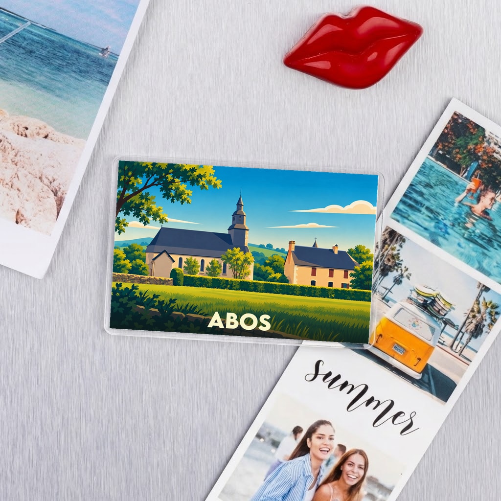 Magnet souvenir de la ville d'Abos avec une illustration stylisée de son église et de ses paysages.