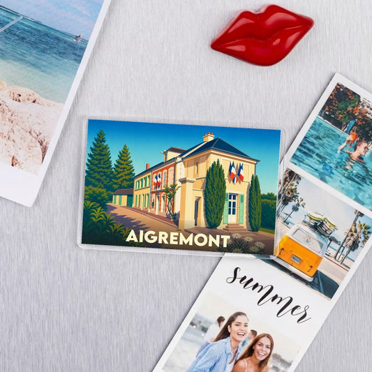 Magnet souvenir de la ville de Aigremont avec une illustration stylisée.