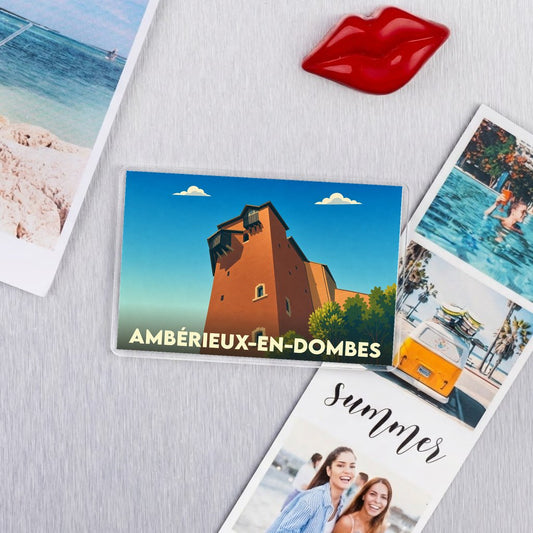 Magnet souvenir de la ville d'Ambérieux-en-Dombes avec une illustration stylisée de son château.
