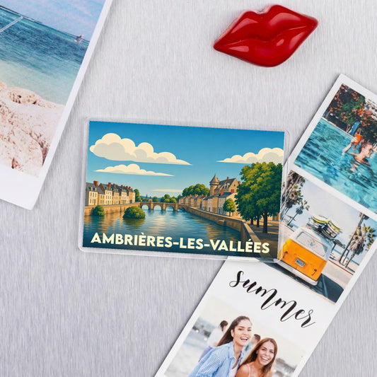 Magnet souvenir de la ville de Ambrières-les-Vallées avec une illustration stylisée.