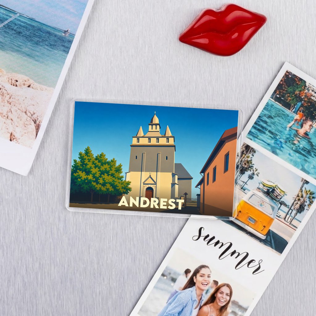 Magnet souvenir de la ville de Andrest avec une illustration stylisée de son église fortifiée.
