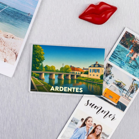 Magnet souvenir de la ville de Ardentes avec une illustration stylisée d'un pont traversant une rivière.