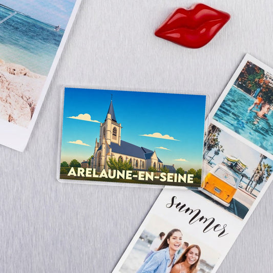 Magnet souvenir de la ville d'Arelaune-en-Seine avec une illustration stylisée de son église.