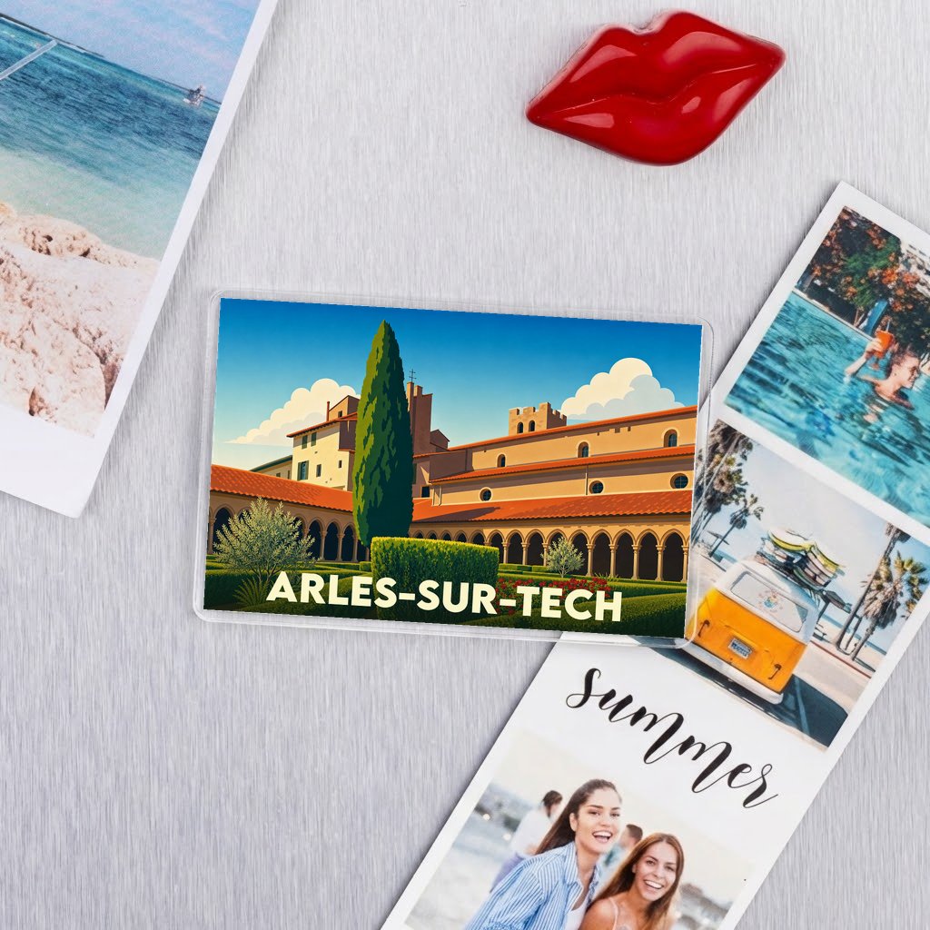 Magnet souvenir de la ville d'Arles-sur-Tech avec une illustration stylisée de son abbaye.