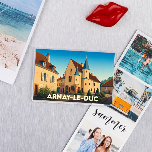 Magnet souvenir de la ville d'Arnay-le-Duc avec une illustration stylisée de son architecture historique.