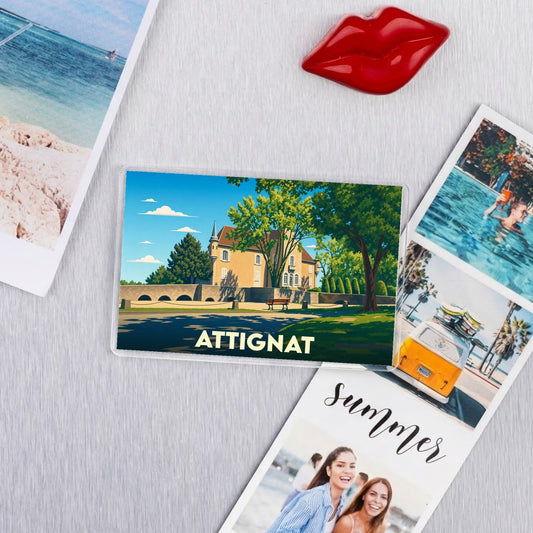 Magnet souvenir de la ville d'Attignat avec une illustration stylisée.