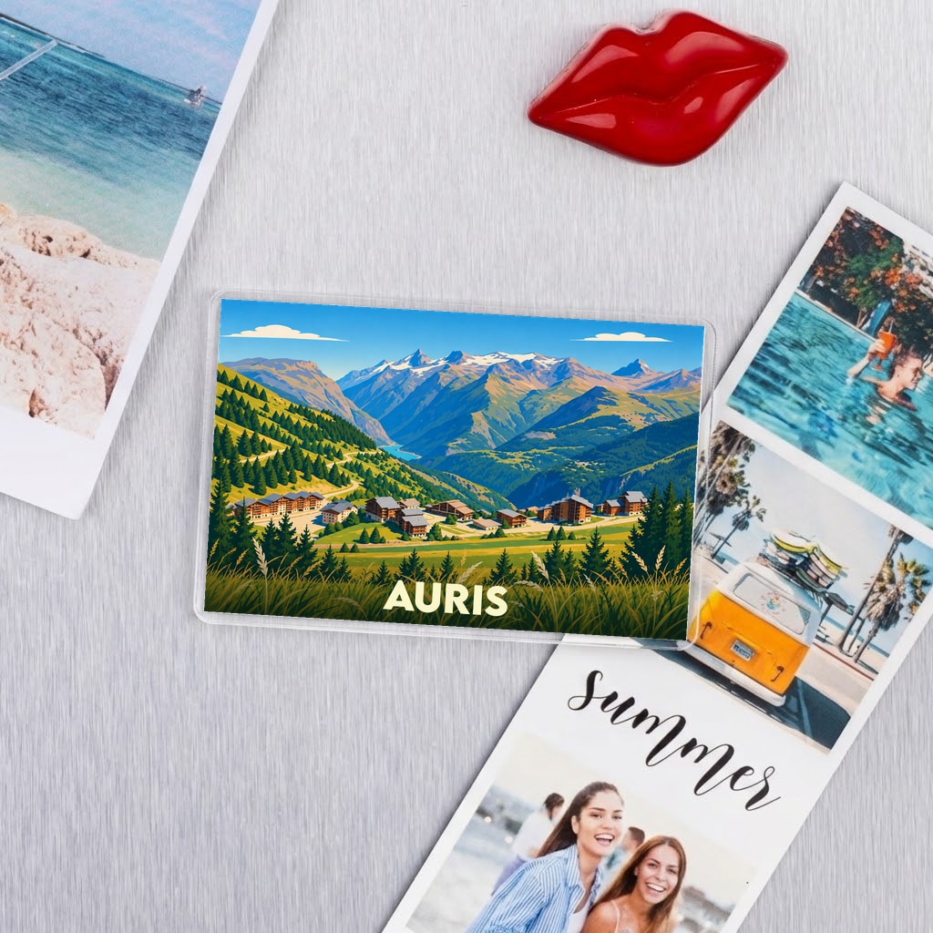 Magnet souvenir de la ville d'Auris avec une illustration stylisée de montagne.