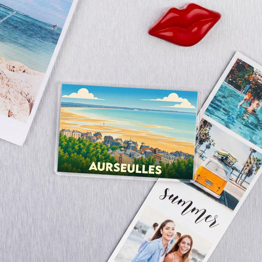 Magnet souvenir de la ville de Aurseulles avec une illustration stylisée de son bord de mer.