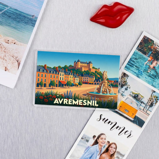 Magnet souvenir de la ville d'Avremesnil avec une illustration colorée représentant un château et une fontaine.