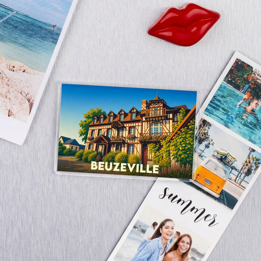 Magnet souvenir de la ville de Beuzeville avec une illustration stylisée d'une maison normande à colombages.