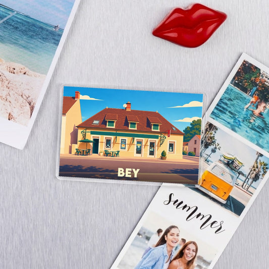 Magnet souvenir de la ville de Bey avec une illustration stylisée d'un bâtiment typique.