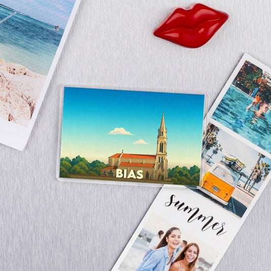 Magnet souvenir de la ville de Bias avec une illustration stylisée.